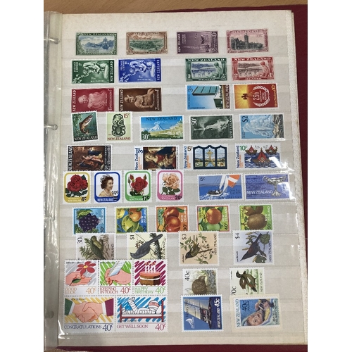 53 - STAMPS Commonwealth unmounted mint Australia, Canada and New Zealand in red album