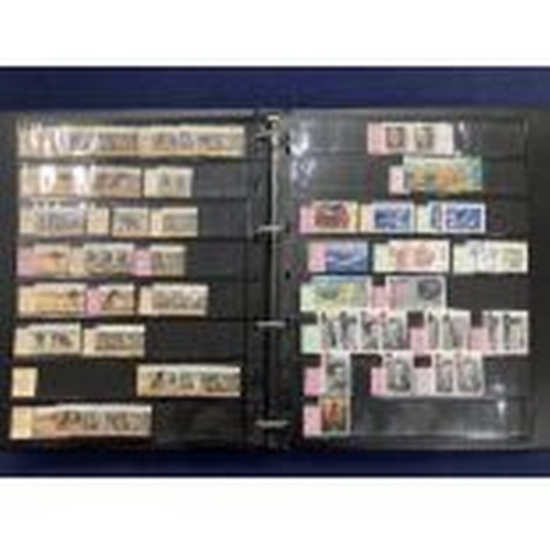 391 - STAMPS AUSTRALIA Mint and used ex dealers stock, well filled display book with better spotted Roo's ... 