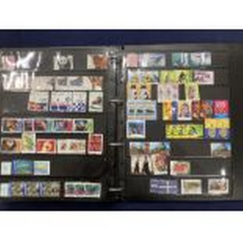 391 - STAMPS AUSTRALIA Mint and used ex dealers stock, well filled display book with better spotted Roo's ... 