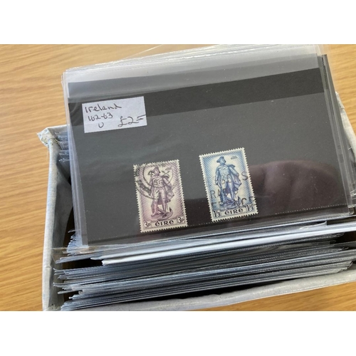 470 - STAMPOS IRELAND Small box of dealers stockcards mint and used and booklets (Priced to Sell at £600)