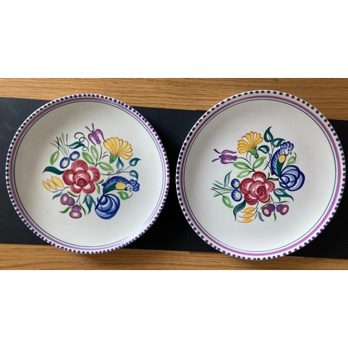 477 - Pair of hand painted Poole Pottery plates marked and signed to the base