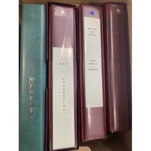 13 - STAMPS BRITISH AFRICA, a mint & used collection of British East Africa & Nigeria, housed in four bin... 