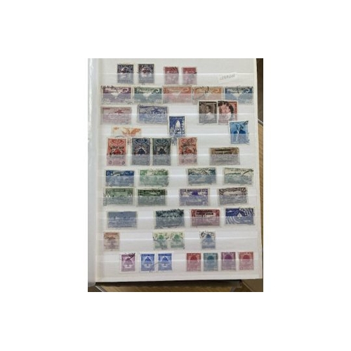 8 - STAMPS Nine stockbooks with stamps of the World, including Far East, Europe etc plus a small amount ... 