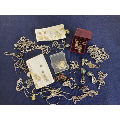 59 - Large amount of costume jewellery, maybe some unmarked silver chains