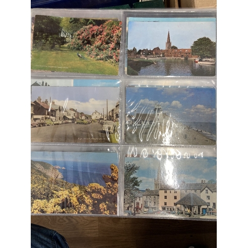 90 - Four large postcard albums with cards mainly modern various topics (100's)