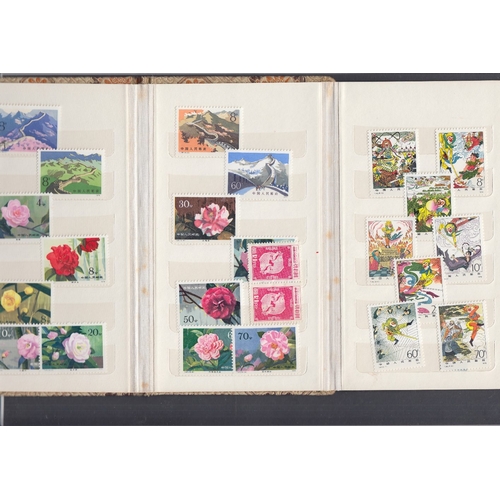 407 - STAMPS CHINA Two small Chinese stock book with unmounted mint 1978 Galloping Horses and 1980 Flowers... 