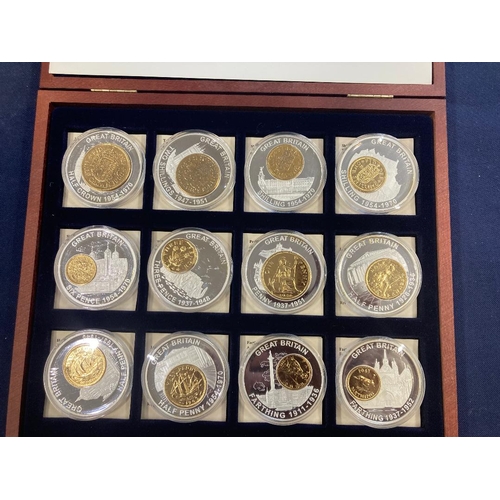 693 - COINS Presentation box with large History of Currency coins Copper Nickel with gold plating