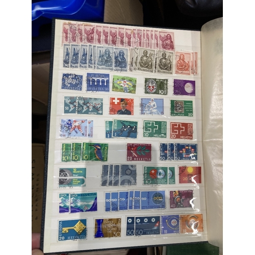 99 - STAMPS Mixed box including Switzerland and UN albums, couple of GB year packs plus some philatelic a... 