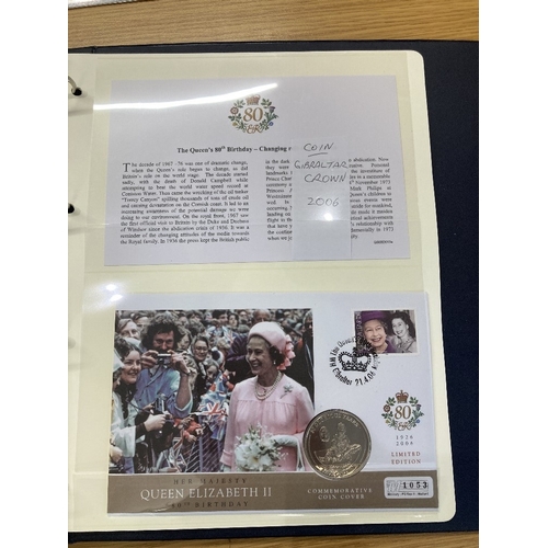 568 - COINS Two album of coin covers for 80th Birthday of Queen Elizabeth II (21 covers)