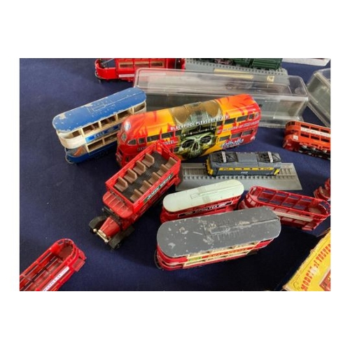 27 - Box of various model trains and trams some on display bases