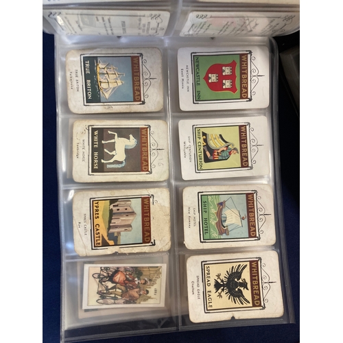 114 - Four albums of Cigarette cards, Wills, Players., Ogdens etc plus Whitbread signs, football teams,