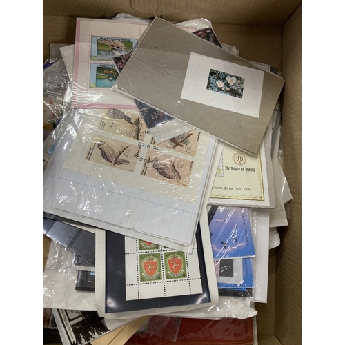 54 - STAMPS World accumulation on stock cards, plus some ephemera items such as receipts etc, a real mixe... 