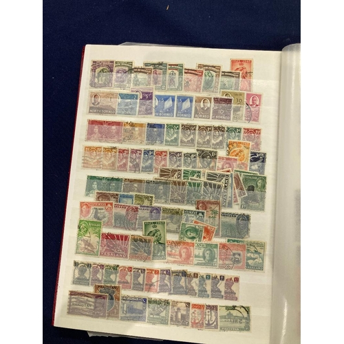 47 - STAMPS British Commonwealth mint and used in red stockbook, some duplication but not extensive, all ... 