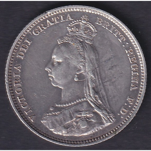 125 - 1887 QV Silver Shilling in very fine condition