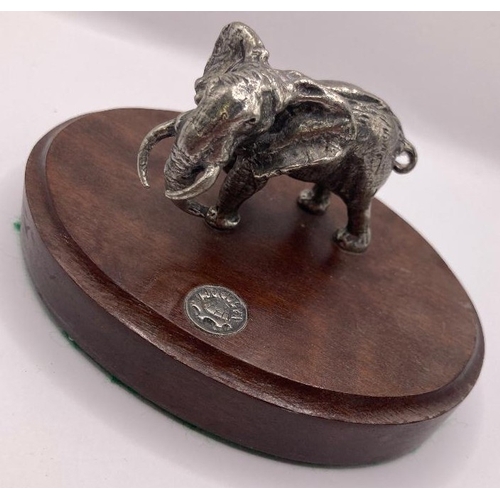 16 - White metal Elephant on stand, could be silver but not marked