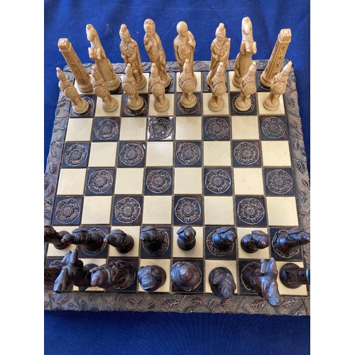 18 - Tudor Rose design heavy chess board with full set of resin pieces