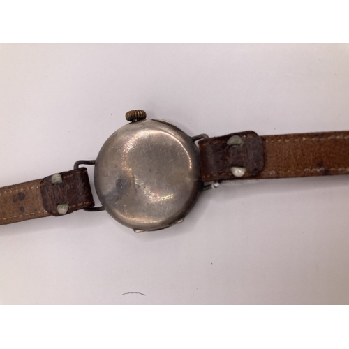 212 - Vintage Silver cased wristwatch with winder by the 9 ! for wearing on right hand, doesn't appear to ... 