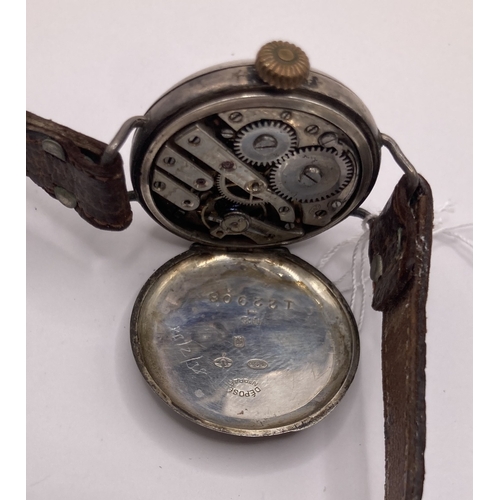 212 - Vintage Silver cased wristwatch with winder by the 9 ! for wearing on right hand, doesn't appear to ... 