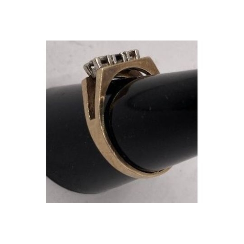 221 - Jewellery : 9ct Gold ring Size Q with two small illusion set diamonds (tested) and central dark ston... 