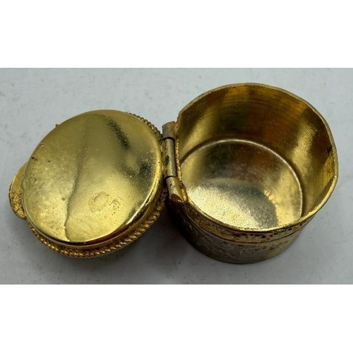 177 - Small enamelled top pill box in gilt metal