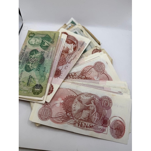 88 - Large batch of old UK bank notes 10/- and £ plus a few World notes