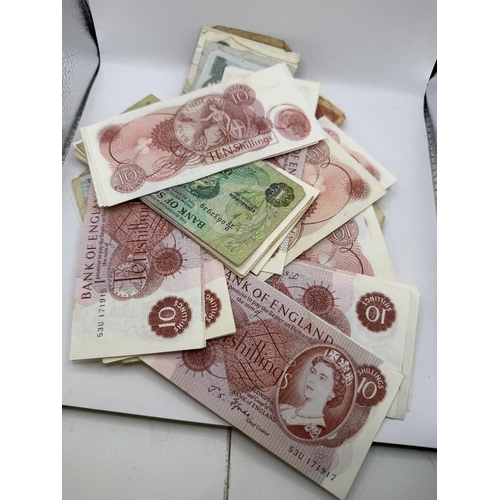 88 - Large batch of old UK bank notes 10/- and £ plus a few World notes