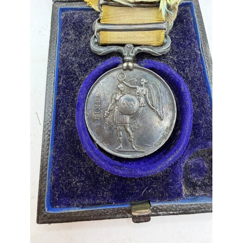 166 - Crimea boxed medal with Sebastopol and Inkermann bars, edge engraved Josh Stanley Gunner