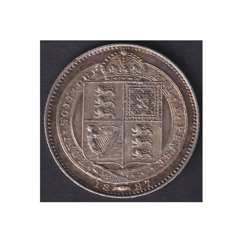 124 - 1887 QV Silver Shilling in good to fine condition