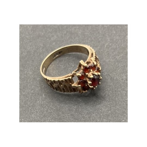 16 - Jewellery 9ct GOLD ring with red stones possibly garnets 2.7g      PLEASE MAKE SURE YOU READ TERMS A... 