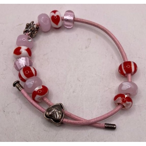 41 - Jewellery: Pandora style bracelet with coloured beads and a silver turtle charm. Heart clasp marked ... 