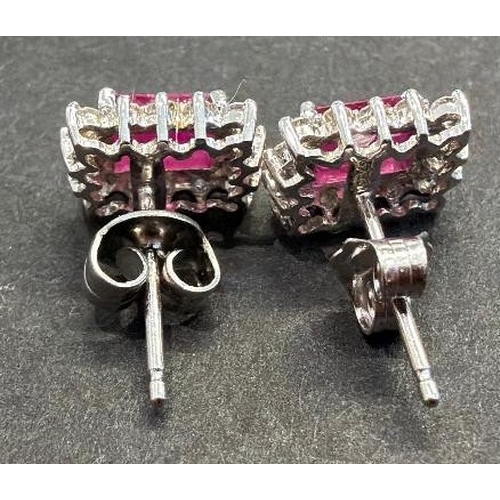 3 - Jewellery : Pair of earrings with central rectangular stones, appear to be rubies, marked 18ct White... 