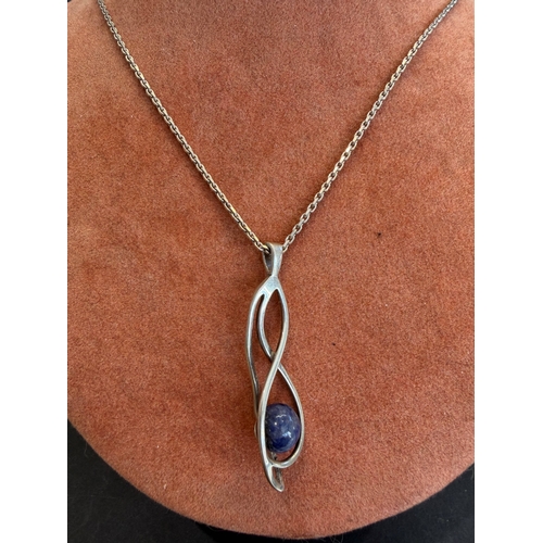 35 - Jewellery : Renni Machintosh style pendant hall marked CJL 925 and 925 silver chain, total weight 7.... 