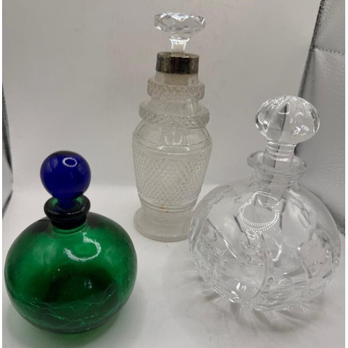 57 - Three old Perfume bottles including one with silver collar