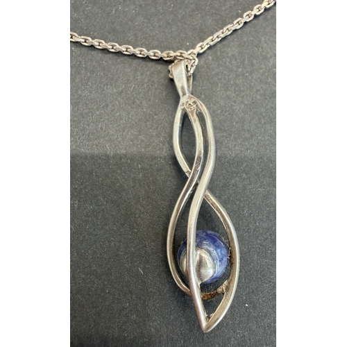 35 - Jewellery : Renni Machintosh style pendant hall marked CJL 925 and 925 silver chain, total weight 7.... 