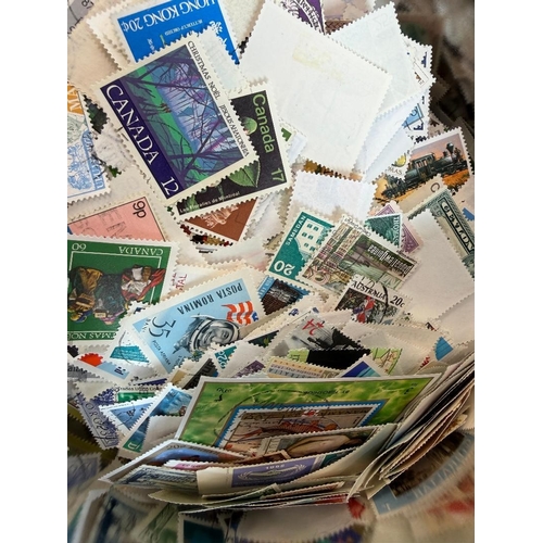 86 - STAMPS Tin of All Worlds off paper many 1000's of stamps mint and used