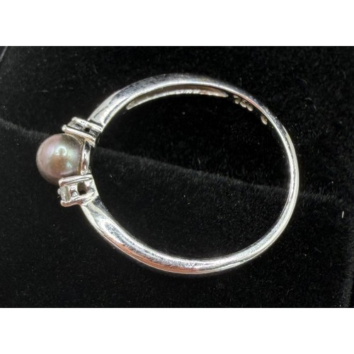 54 - JEWELLERY : 18ct White GOLD diamond and pearl ring size M-L 1.5g

(Preferred Payment method by bank ... 