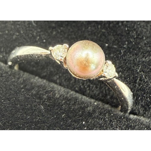 54 - JEWELLERY : 18ct White GOLD diamond and pearl ring size M-L 1.5g

(Preferred Payment method by bank ... 