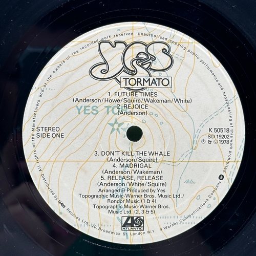 22 - A 12 inch vinyl album by Yes - Tormato,in good condition, no scratches, cover has some corner marks