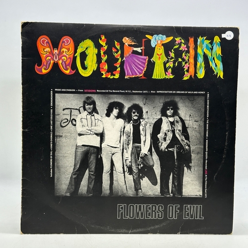 24 - A 12 inch vinyl album by Mountain - Flowers of Evil, cover has some age scuff marks on edges & corne... 