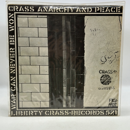 32 - A double 12 inch vinyl by Crass - Stations of the Cross, cover / pull out is in good condition but i... 