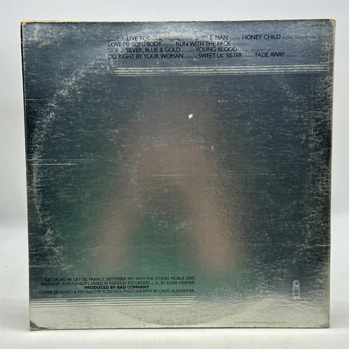 35 - A 12 inch vinyl album by Bad Company - Run With the Pack, cover has some age scuffs on the edges, no... 