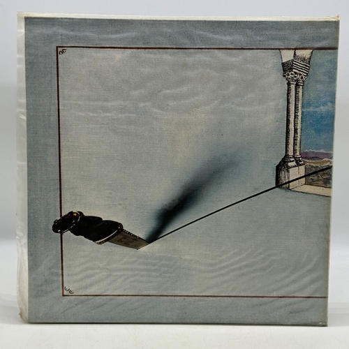 42 - A 12 inch vinyl album by Genesis - Trespass, cover in a plastic sleeve, vinyl in good condition, no ... 