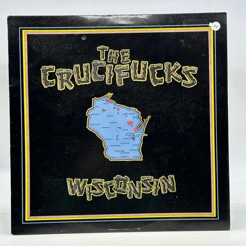 48 - A 12 inch vinyl album by The Crucifucks - Wisconsin, cover in good order, vinyl is bright yellow and... 