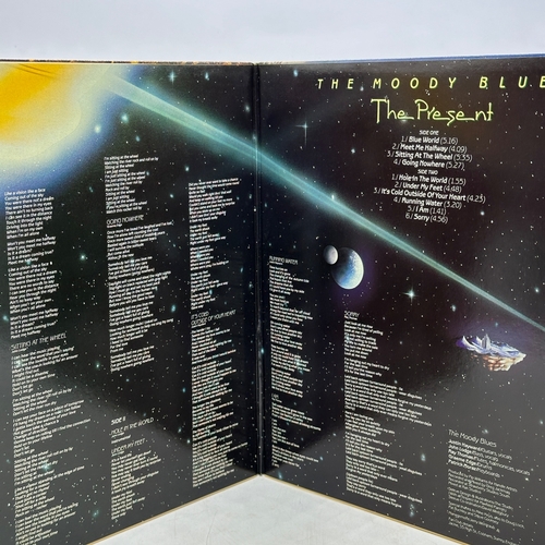 56 - A 12 inch vinyl album by Moody Blues - The Present