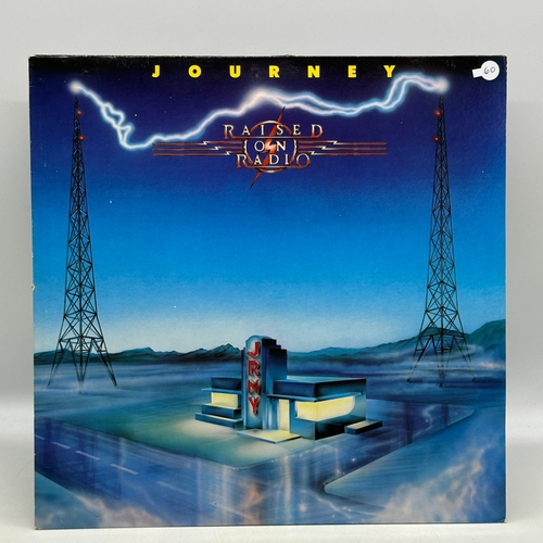 60 - A 12 inch vinyl album by Journey - Raised on Radio