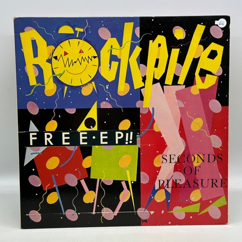 64 - A 12 inch vinyl album by Rockpile - Seconds of Pleasure