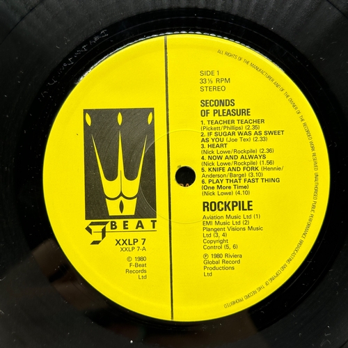 64 - A 12 inch vinyl album by Rockpile - Seconds of Pleasure