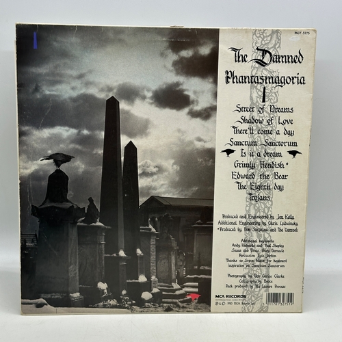 84 - A 12 inch vinyl album by The Damned - Phantasmagoria, cover has a large sticker on it