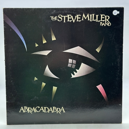 115 - A 12 inch vinyl album by The Steve Miller Band - Abracadabra