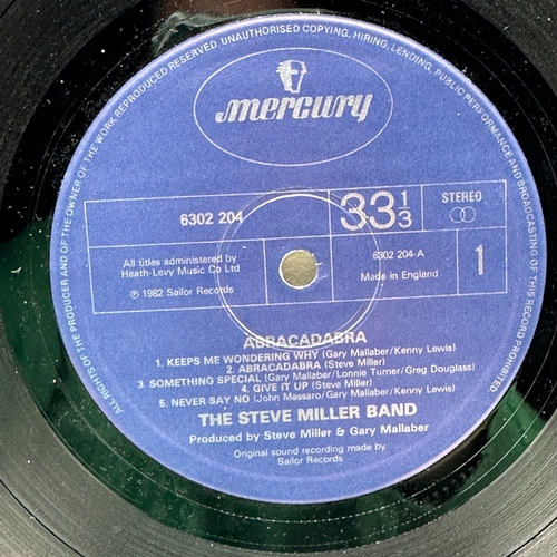 115 - A 12 inch vinyl album by The Steve Miller Band - Abracadabra